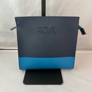 Blue and Black United Amnenities Bag